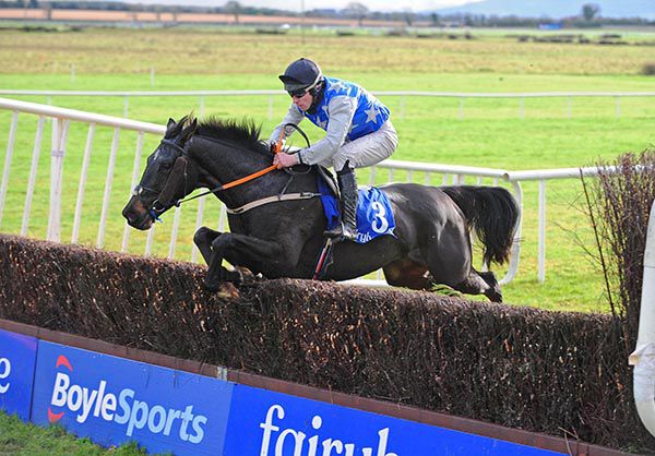 Rose Milan and Chris O'Donovan jump the last