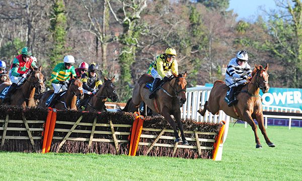 French Aseel and Denis O'Regan (right) clear the last before easily winning the 3-y-o maiden hurdle