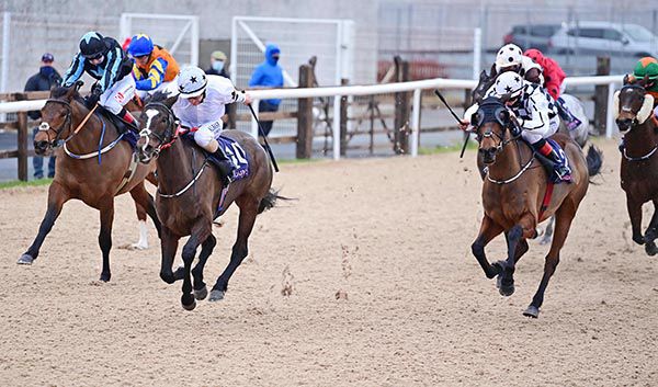 Top Line Tommy and Colin Keane (two shades of blue) come through to collar Arctic Blaze(white face)