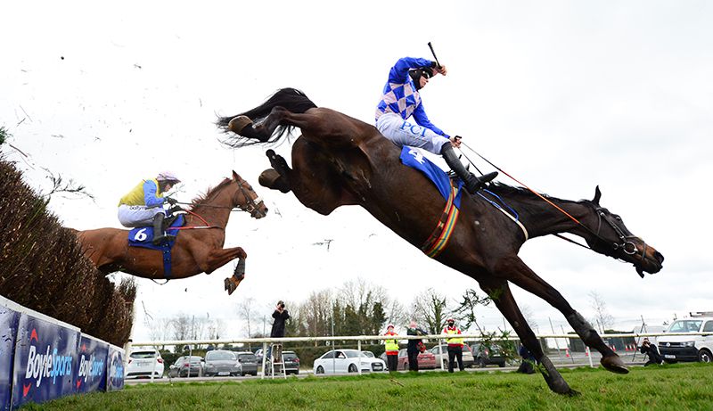 Great Khan blunders at the last as Getaday (far side) gives chase