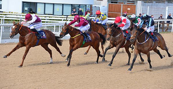 White and red silks (second from right) Chris Hayes comes with a winning run on Chateau Musar