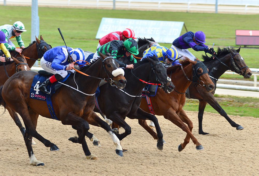 A great shot of the action in Dundalk's 6th event as Alhaazm (nearside) is delivered with his winning run by Chris Hayes