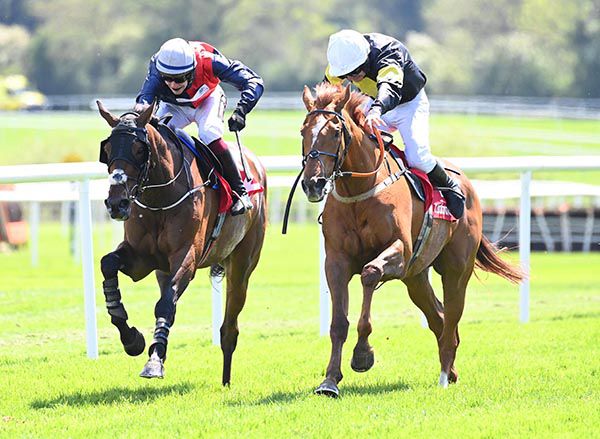 Powersbomb (right) beating Us And Them