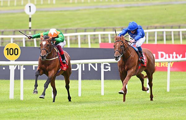 Lone Eagle (left) is run down by Hurricane Lane at the Curragh 
