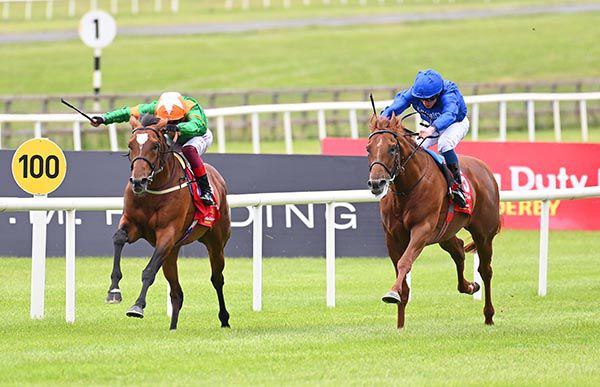 Lone Eagle (left) is run down by Hurricane Lane at the Curragh 