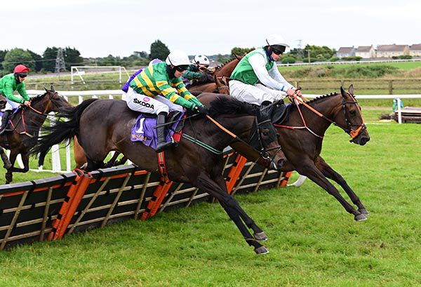 Getaway Queen (far side) & General Moriviere jump the last together 