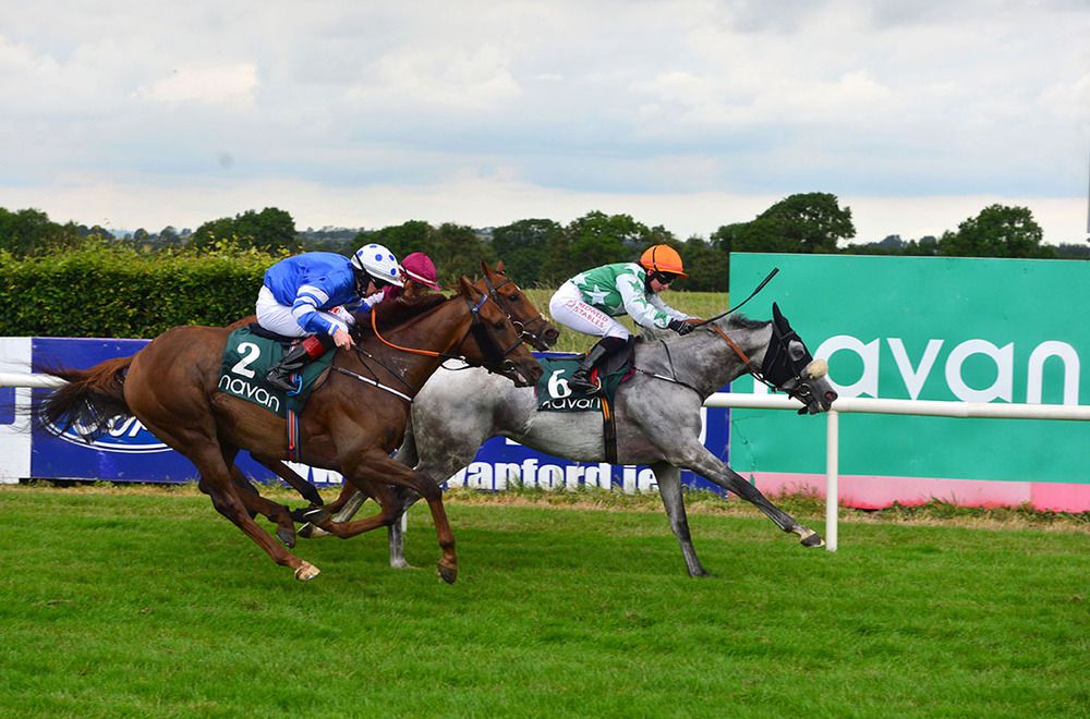 Maricruz and Siobhan Rutledge hold Sea Trout Reach
