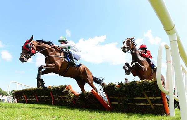 Baltinglass Hill, right, comes to claim Rich Belief after the last 