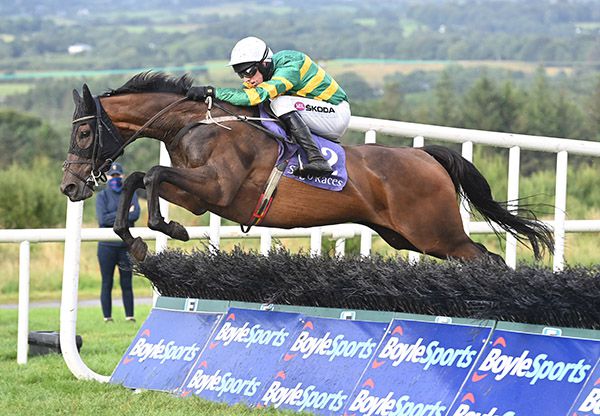 Arctic Warrior jumps the last under Mark Walsh