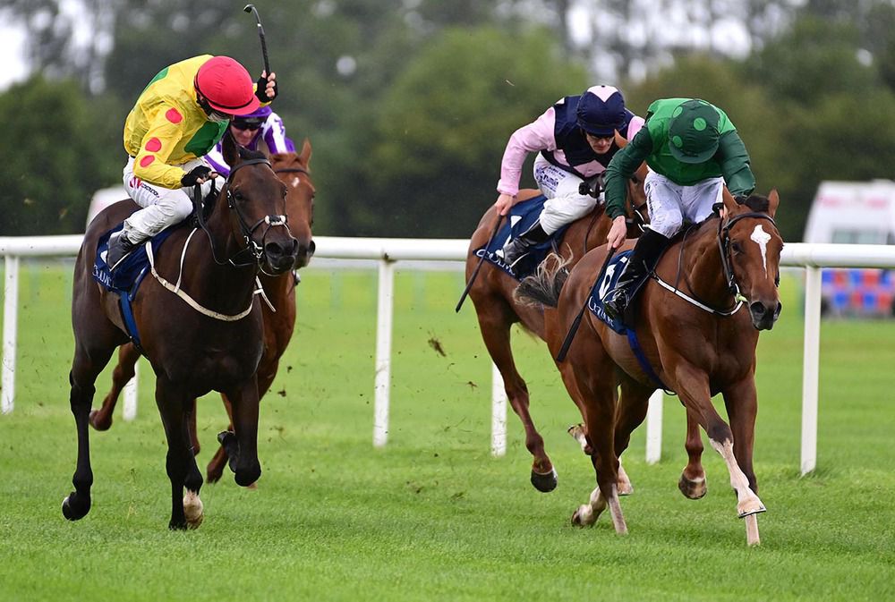 Seisai, green, winning by half a length