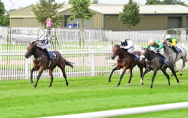 Provocateuse and Scott McCullagh (left) win from Young Angel (noseband) 