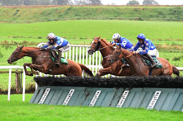 So Near So Farhh, left, jumps the last in the lead