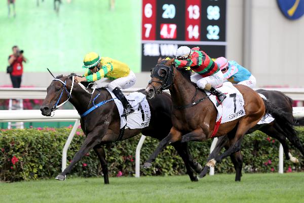 Sky Darci (inside) lands the BMW Hong Kong Derby.