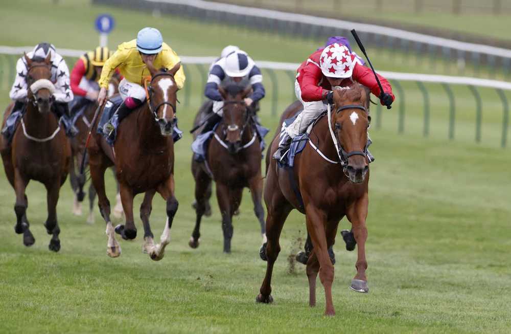 Saffron Beach and William Buick race clear to win the Sun Chariot Stakes