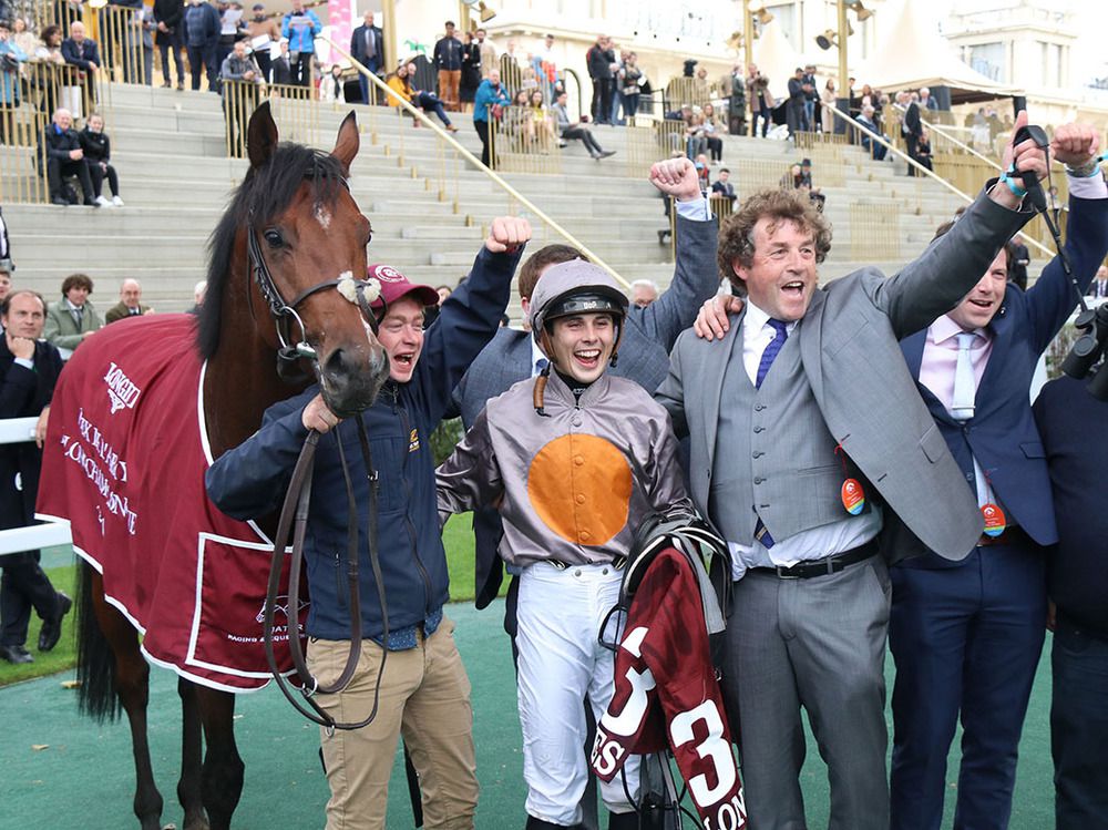 Ronan Whelan and Ado McGuinness celebrate A Case Of You's win in the Abbaye at Longchamp