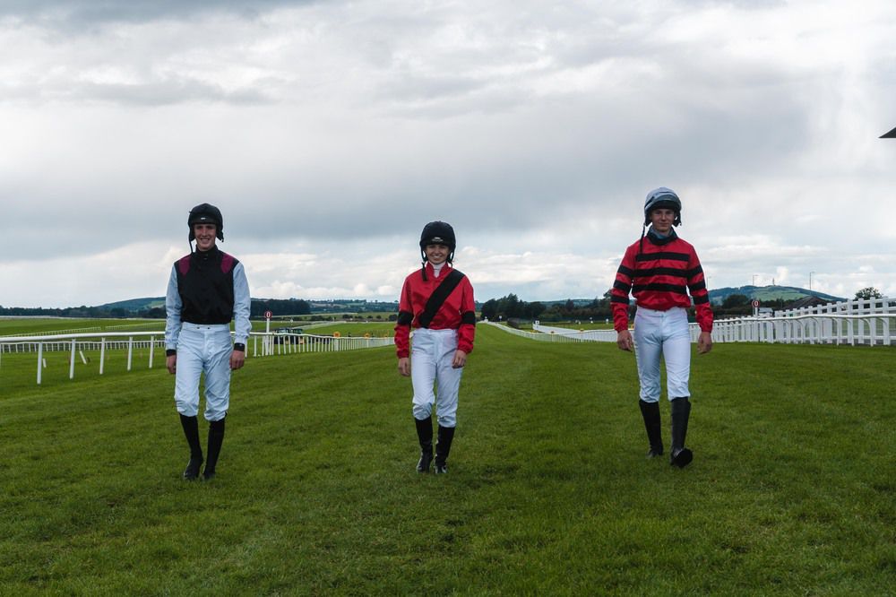 Student riders Ben Harvey (Maynooth), Aine Lane (UCG) and Luke O'Neill (TCD) inspecting the Curragh
