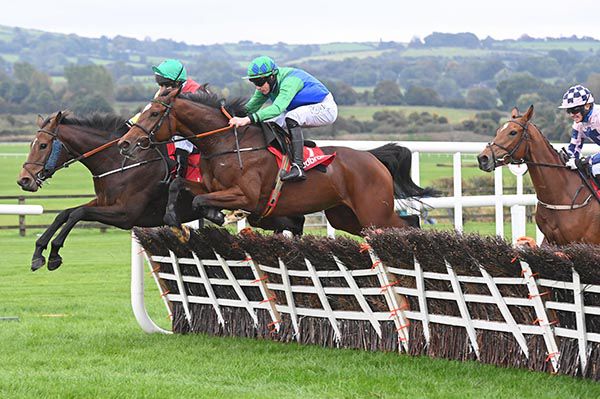 Bell Ex One, near side, pops the last on his way to victory