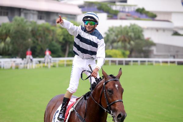 Karis Teetan celebrates atop Panfield 