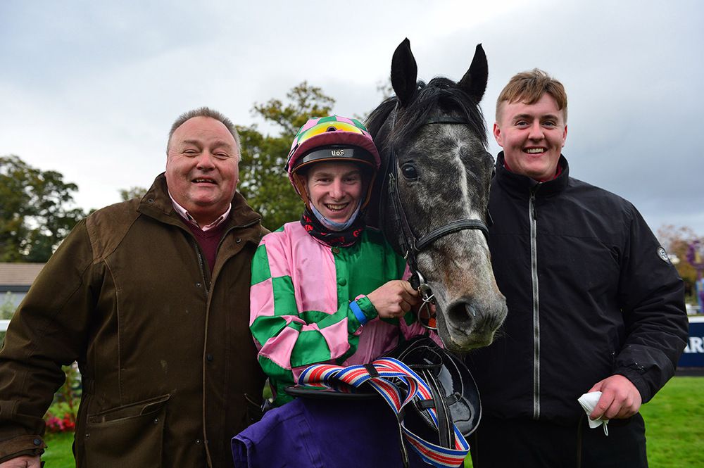 Wesley Joyce pictured with Mick Mulvany (left) and his son Larry after In From The Cold won at Leopardstown