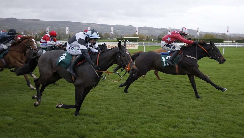 Mc Alpine and James O'Sullivan (red with white stars) hit the front after the last 