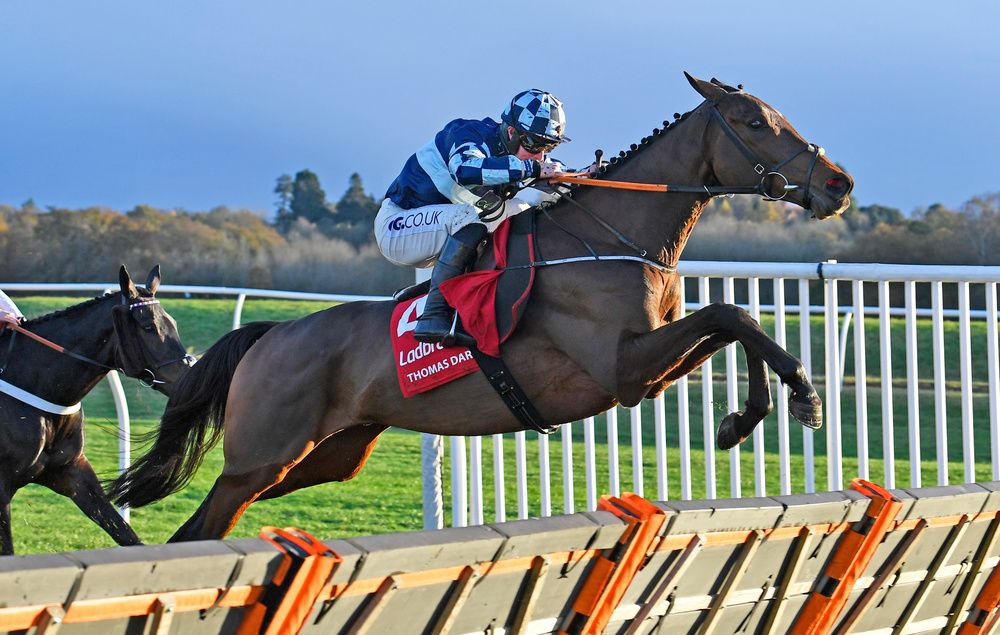 Thomas Darby winning the Ladbrokes Long Distance Hurdle at Newbury 