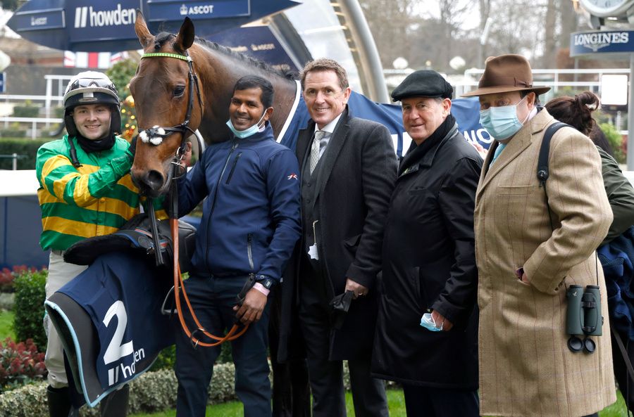 Champ pictured with connections after winning at Ascot last year