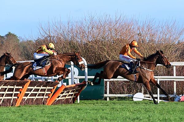 Royal Kahala chases Heaven Help Us over the last