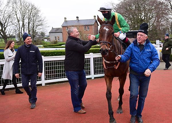 Conor Orr, on Bythesametoken, is congratulated by owner Rob Monroe