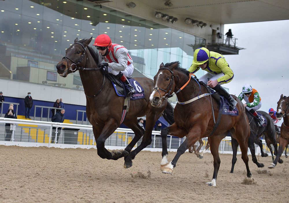 Sunwalk (left) holds Jaafel by a neck