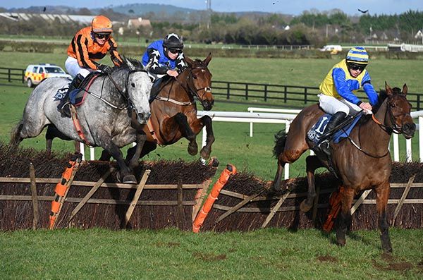 Sparkling Stars (left) mounts his challenge at the last