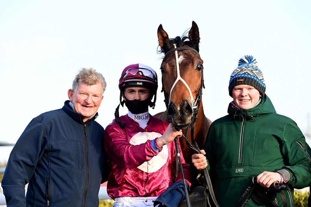Pat Martin (left) with son Jack, jockey Mikey Sheehy and 2022 winner Patrick Street