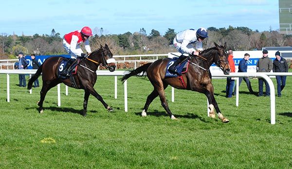 Ballykeel wins, with Gordon Elliott (second from right) watching