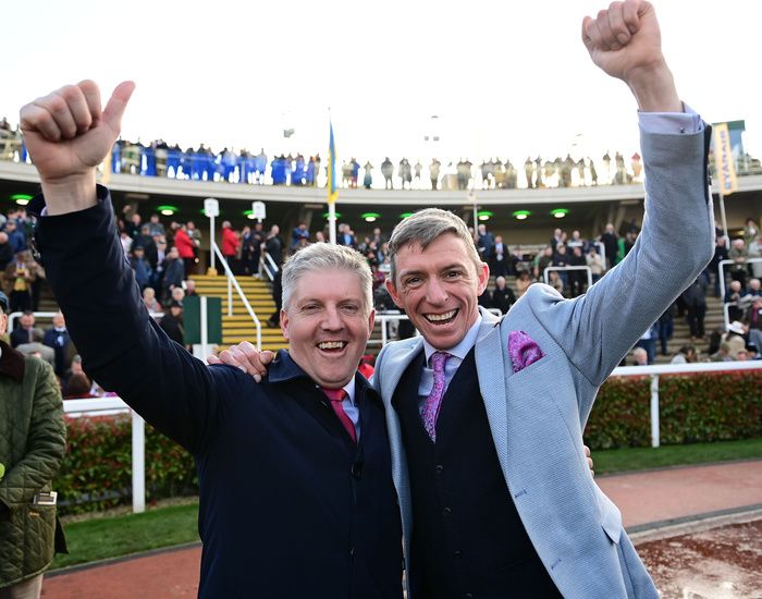 Noel Fehilly (left) and David Crosse celebrate Love Envoi's victory at Cheltenham