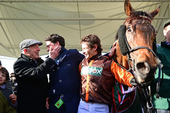 Noble Yeats and Sam Waley-Cohen with trainer Emmet Mullins who is being congratulated by Ted Walsh 