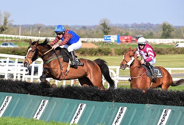 Huntingtown and Phillip Enright jump the last 