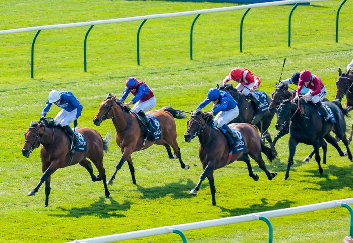 Coroebus (white cap) seen winning the 2,000 Guineas 