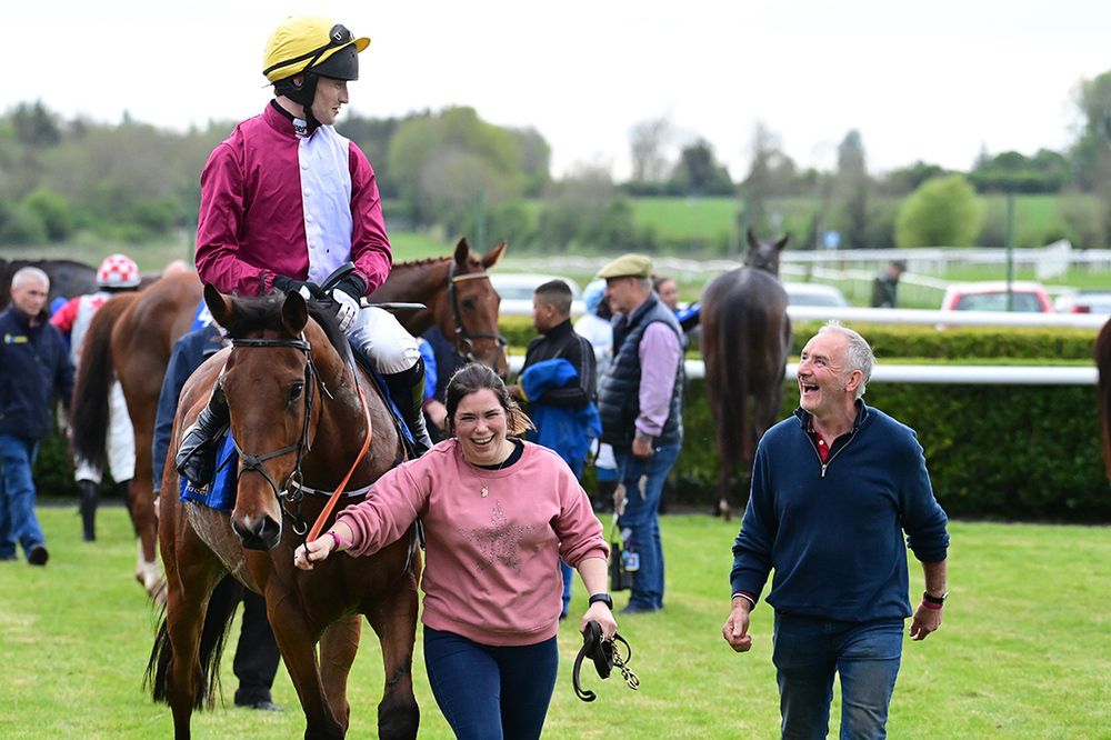 Bushmans Pass returns to the parade ring with a delighted Mick Flannery on the right