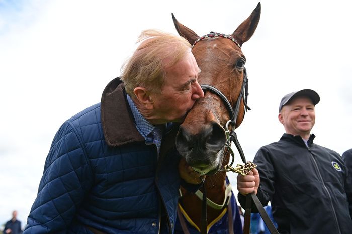 Dermot Weld kisses Homeless Songs after she became his 5th winner of the Irish 1000 Guineas