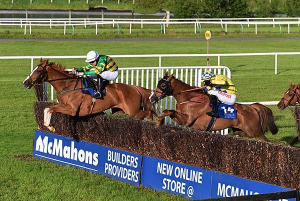 Mica Malpic (far side) leads Bitview Colin over the last