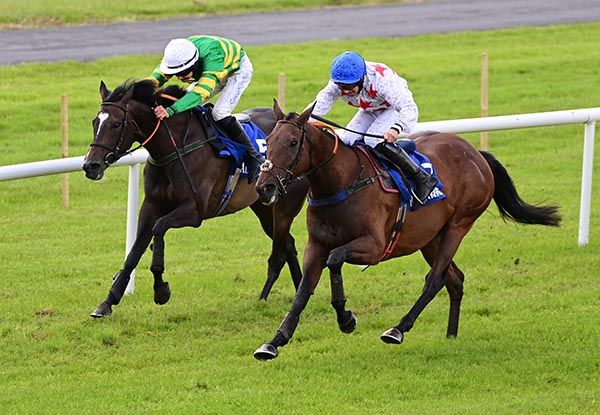 Two Shoe Tom (nearest) comes through to head Ena Baie