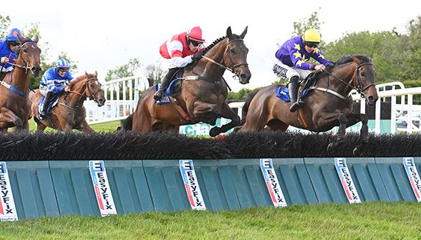 It's Time Again (right) jumps the last under Jack Foley