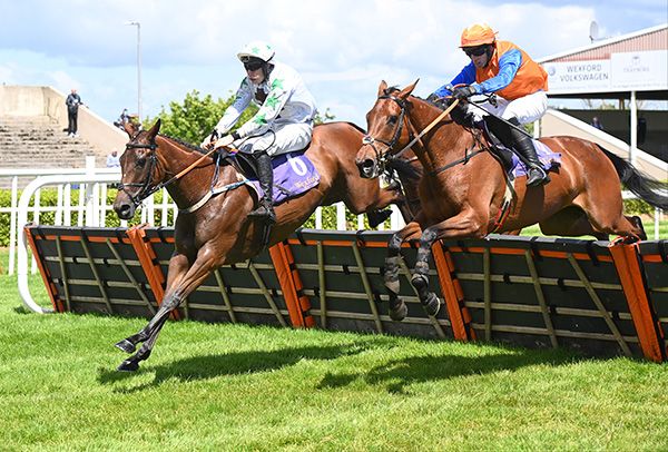 Jakes Dream & Richie Condon (white colours) lead Trendy Lady over the last