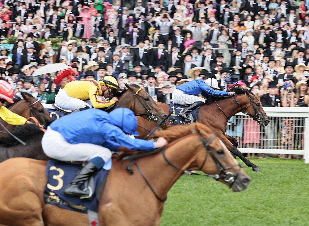 Naval Crown (far side) pictured on his way to victory at Royal Ascot in June