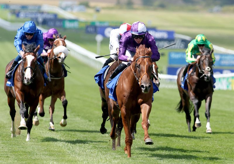 Persian Force and Rossa Ryan winning at Newmarket in 2022