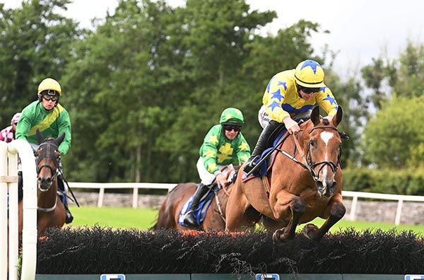 Rebel Rose and Jack Kennedy jump the last