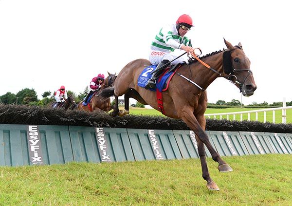 The Bosses Oscar and Davy Russell pictured on their way to victory