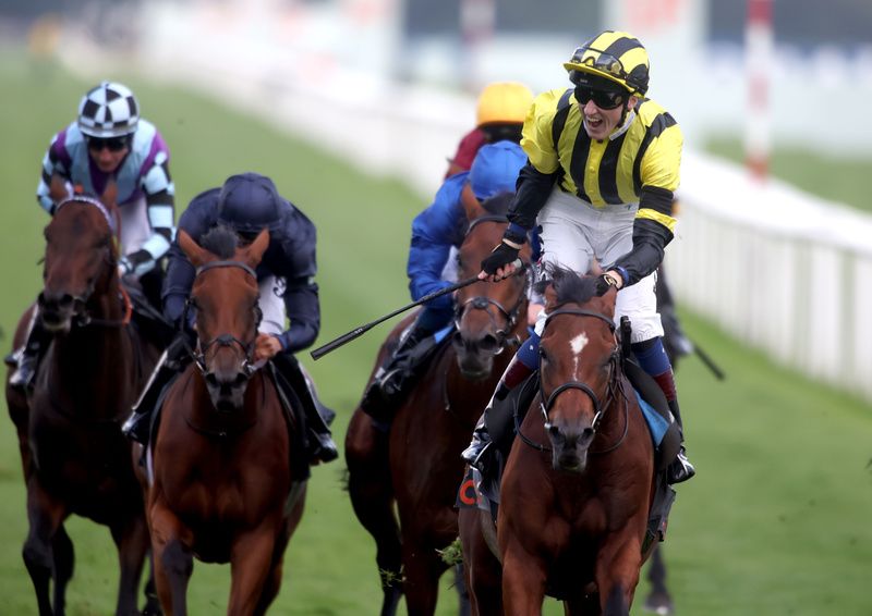 Eldar Eldarov and David Egan winning the St Leger Stakes at Doncaster. 