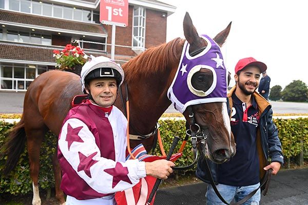 Cristiano Martins pictured with The Cola Brasil and his son Jhonattan