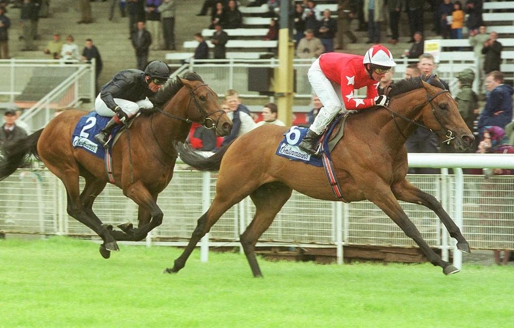 Rock Of Gibraltar winning the Irish 2,000 Guineas under Mick Kinane at the Curragh in 2002