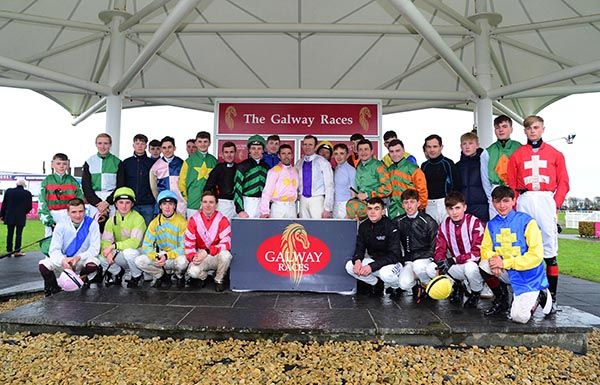 Kevin Manning, white and purple centre, with his weigh room colleagues after announcing his retirement in Galway